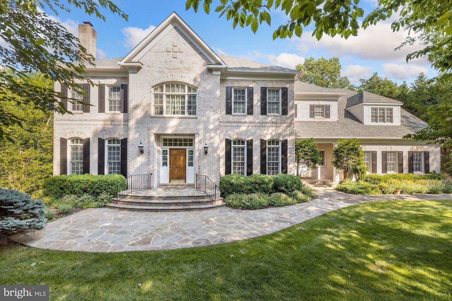 Landscaped approach to a McLean home from the Prime Auction Solutions gallery